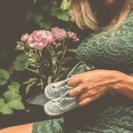 Signs of Nutritional Deficiency in Pregnancy Image showing signs of nutritional deficiency in pregnancy: pale skin, fatigue, and brittle nails