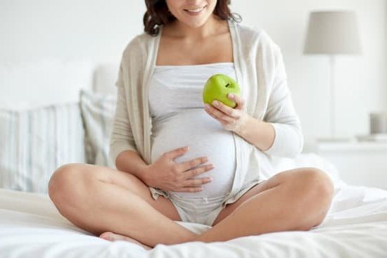 Clear blue positive pregnancy test with two blue lines indicating a positive result