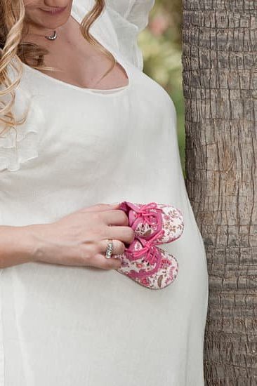 Pregnancy Nausea Image of a pregnant woman experiencing pregnancy nausea