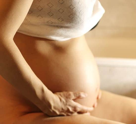 Is Kourtney Kardashian Pregnancy Image of Kourtney Kardashian pregnancy photoshoot, showcasing her beautiful baby bump and maternity glow