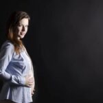 Is Lower Back Pain a Sign of Pregnancy Possible pregnancy symptom: Lower back pain that may indicate pregnancy, consult doctor