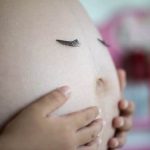 Pregnancy Yoga Pregnant woman practicing gentle yoga poses for relaxation and strength during pregnancy