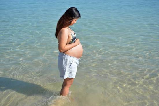 Week 10 Pregnancy 10-week pregnant woman's ultrasound showing baby's development